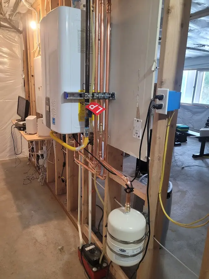 Licensed plumber repairing a kitchen sink in Vail